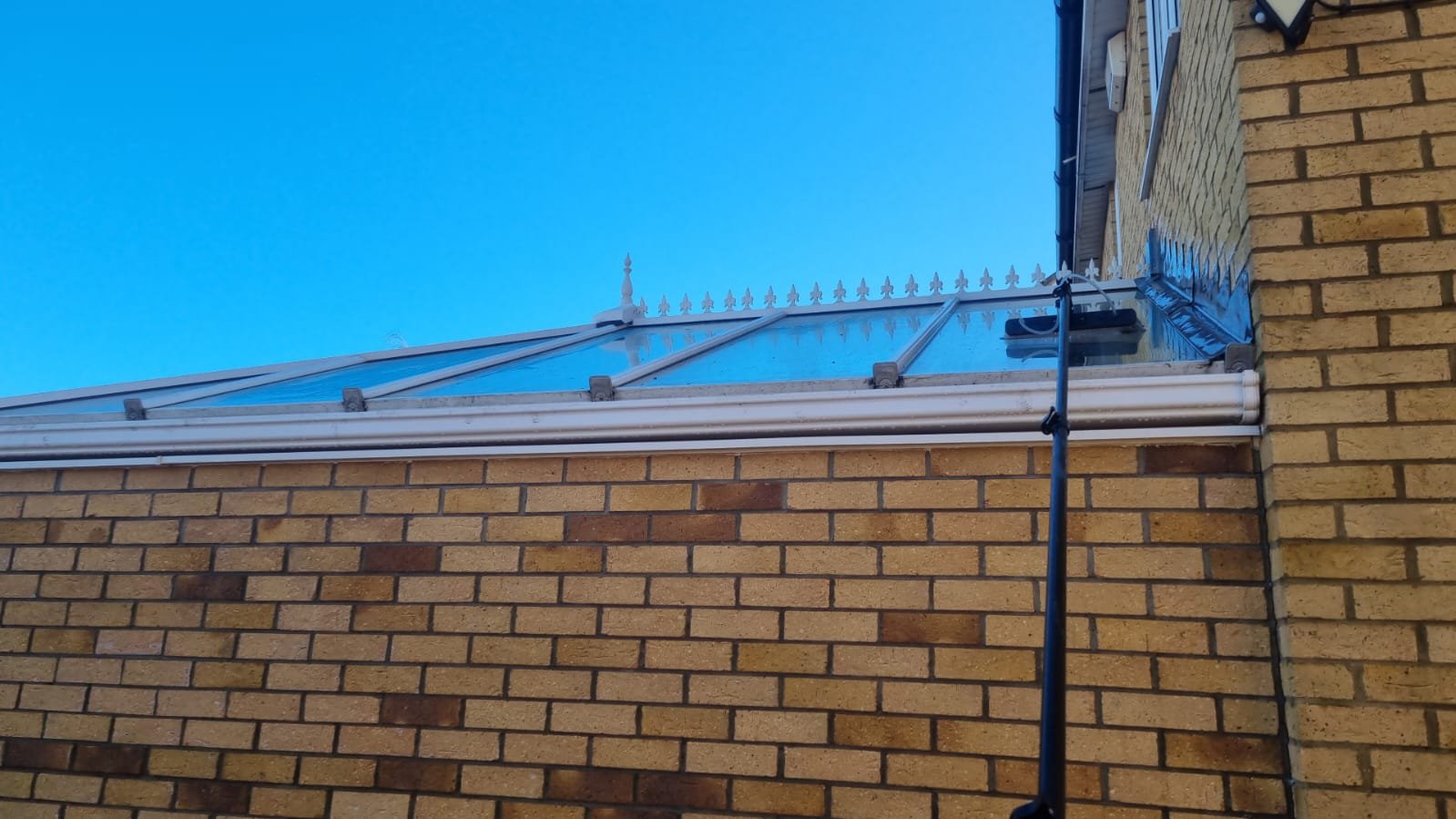 Patchway 4 An image of a water-fed pole cleaning a conservatory roof