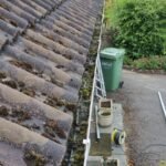 An image of a clogged gutter of a residential house in Bristol